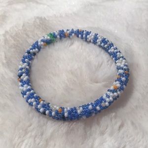 Roll on beaded bracelet, blue and white
